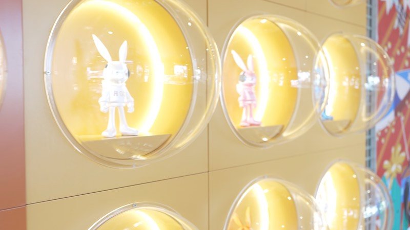 Bunny figurines in glowing wall bubbles