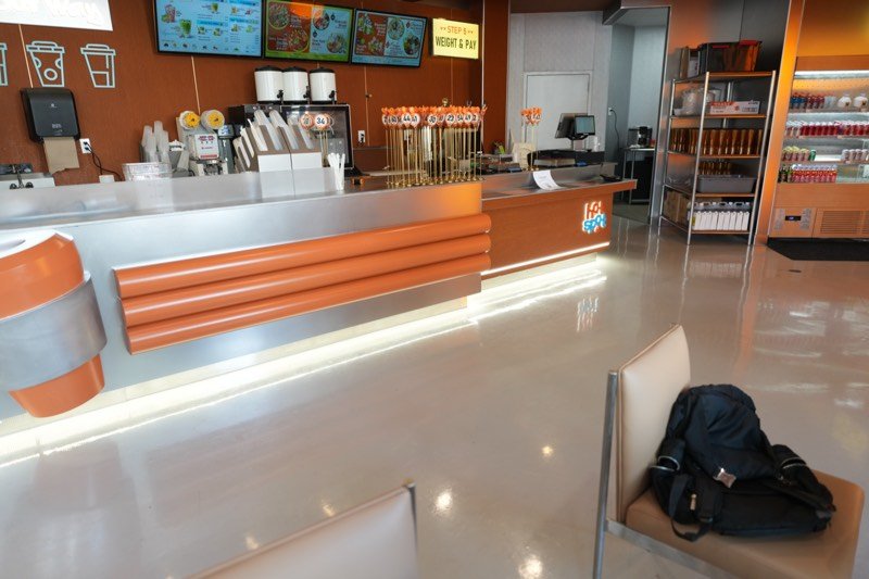 The order counter with orange accents